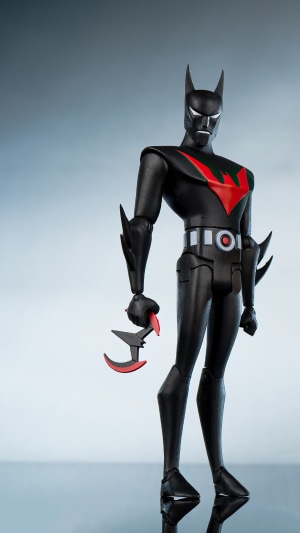 Batman Beyond action figure with weapon