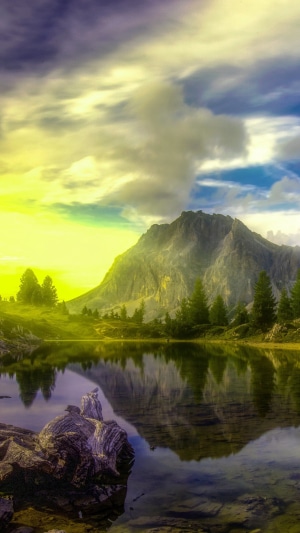 Lake and mountains with dramatic sky