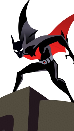 Batman Beyond standing on a building
