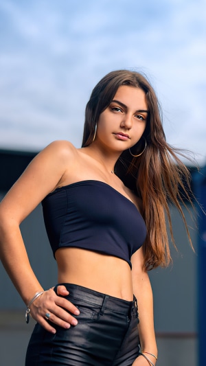Model in tube top and leather pants