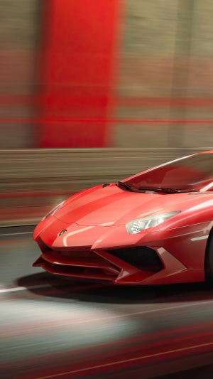 Red Lamborghini Aventador driving through tunnel