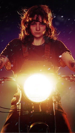 Vic McQueen from NOS4A2 on a motorcycle