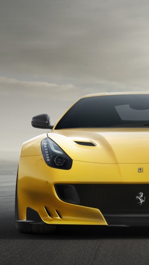 Yellow Ferrari F12berlinetta front view