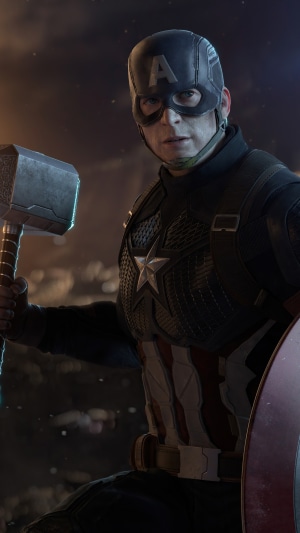 Captain America holding Mjolnir and shield