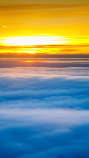 Sunset over clouds 4K