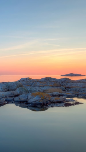 Rocky coastline at sunset 4K