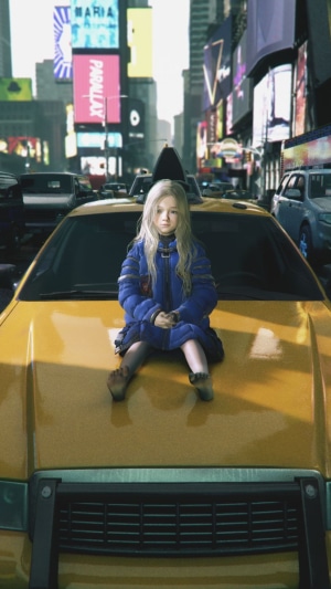 Girl sitting on a yellow taxi in Times Square