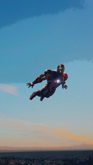 Iron Man flying in the sky over a city