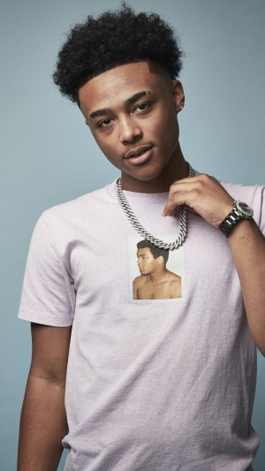Luh Kel wearing a t-shirt with Muhammad Ali