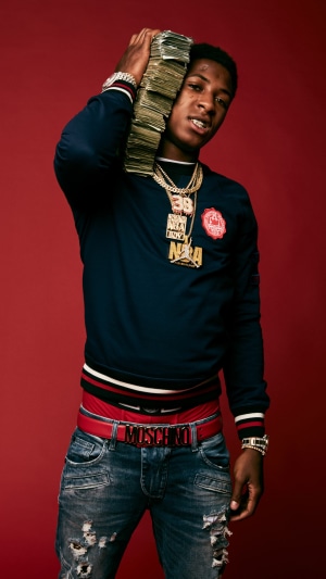 YoungBoy Never Broke Again holding money