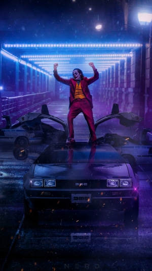 Joker standing on a DeLorean car