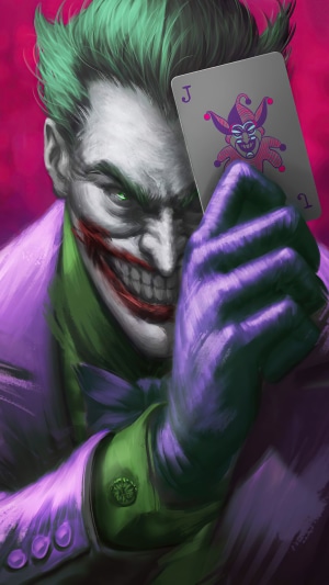 The Joker holding a playing card