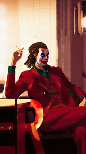 Joker artwork with red suit and makeup