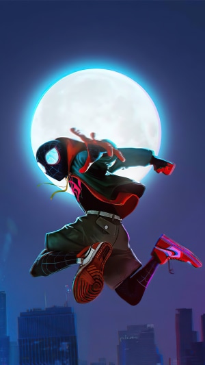 Miles Morales Spider-Man leaping in front of the moon