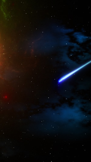 Space with a comet and nebulae