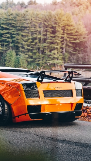 Orange Lamborghini Gallardo with a large rear spoiler