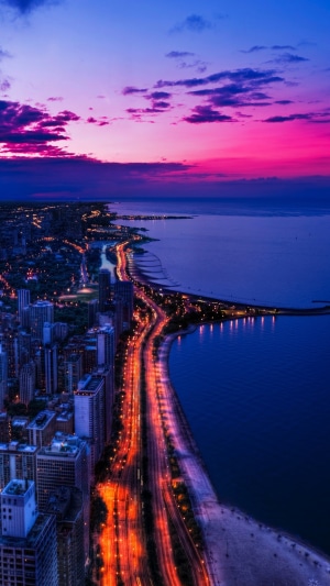 Chicago skyline at dusk with Lake Michigan