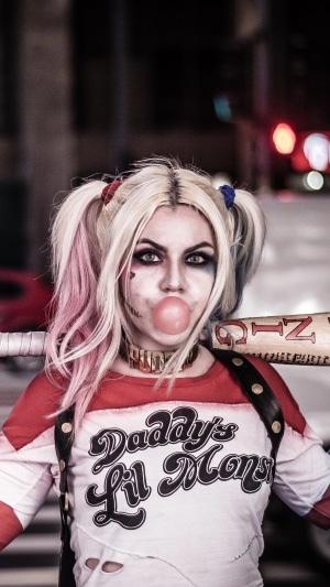 Harley Quinn from DC Comics cosplay with baseball bat