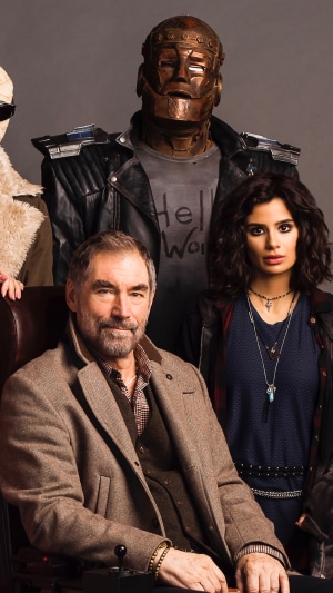 Doom Patrol characters in a studio portrait