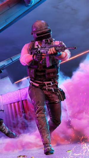 Player from PUBG holding a rifle