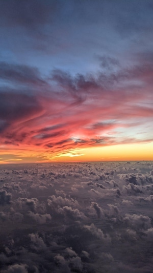 Sunset clouds over a sea of clouds
