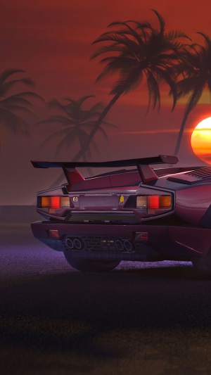 Lamborghini Countach on a beach at sunset