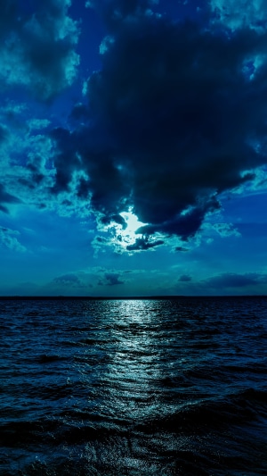 Moonlit sea and clouds