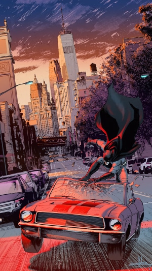 Batman on a car in a city street