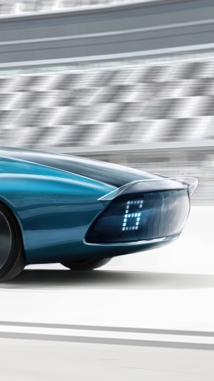 Blue concept car with digital display on race track