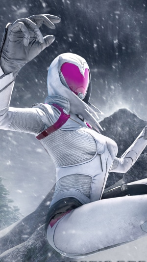 Woman in white suit with pink visor in snow