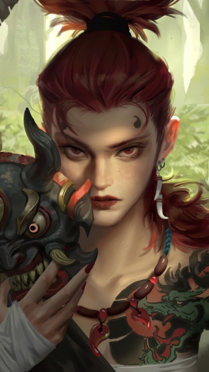 Warrior holding a mask in a forest