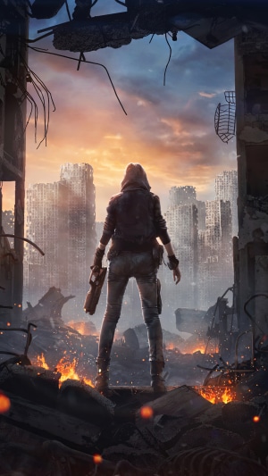 Woman with gun in ruined city at sunset
