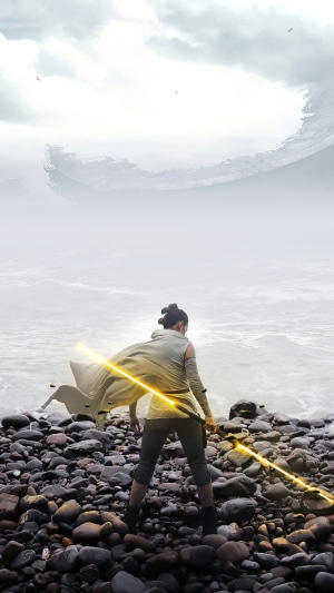 Rey from Star Wars with a lightsaber on a rocky shore