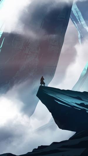 Figure on a cliff overlooking a misty canyon
