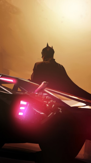 Batman on a vehicle with red lights