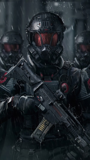 Soldiers in tactical gear with rifles in the rain