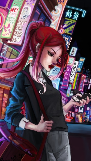 Woman with red hair in a city at night
