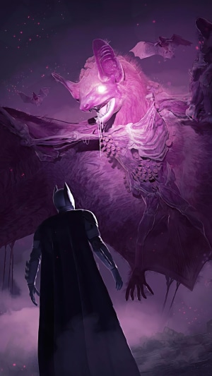 Batman facing a giant purple bat creature