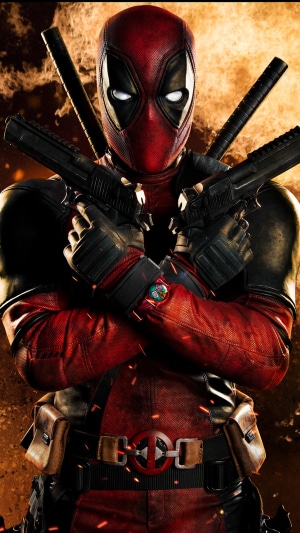 Deadpool holding guns with swords on his back