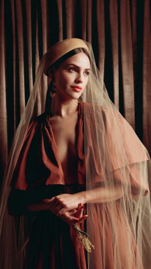 Eiza Gonzalez wearing a veil and hat