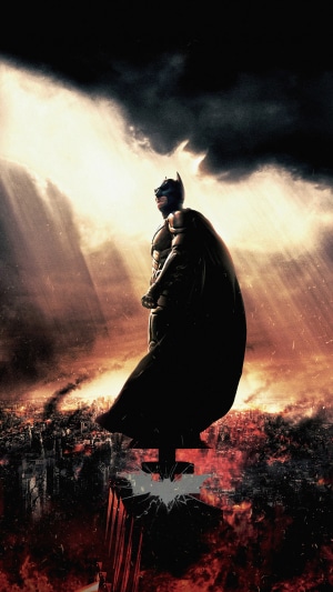 Batman from DC Comics standing on a building