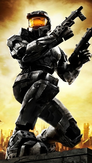 Master Chief from Halo holding two guns