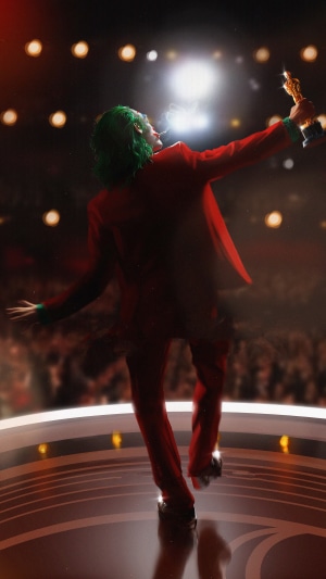 Joker from Joker holding an Oscar award