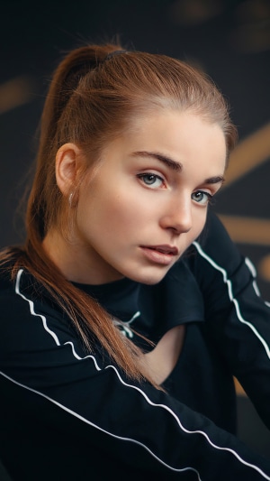 Young woman with red hair and blue eyes