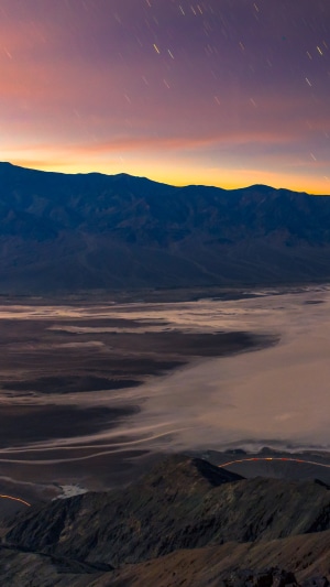 Starry night sky over Death Valley mountains
