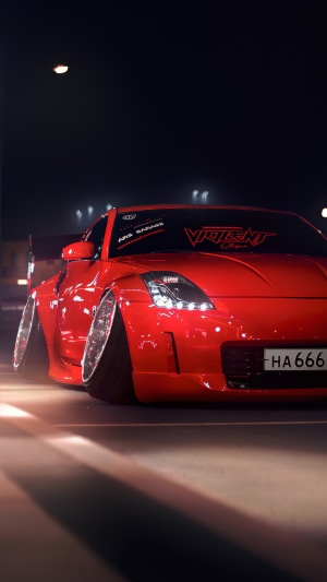 Red Nissan 350Z with custom modifications