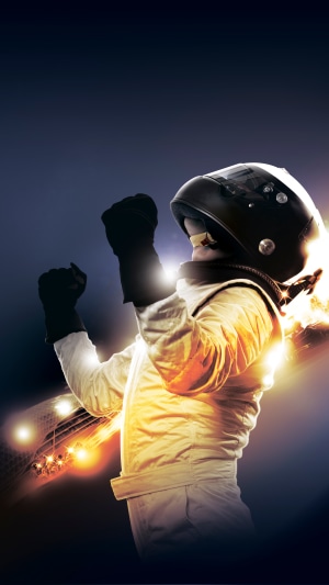 Racer in helmet celebrating victory
