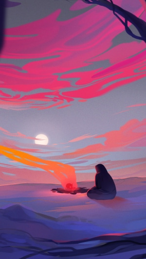 Person sitting by a campfire at sunset