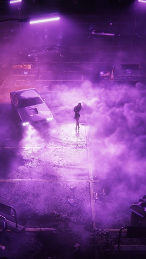 Ballerina in purple smoke with drifting cars