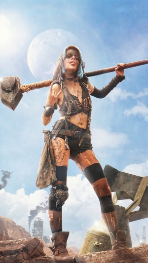 Warrior with a hammer in a post-apocalyptic landscape